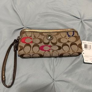 Coach wristlet wallet. SV multicolor signature fabric. 48419